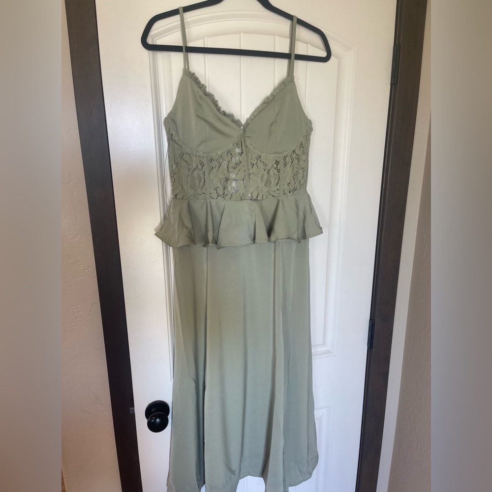 Never worn Sage Corset Dress. Beautiful back with slit. Size M